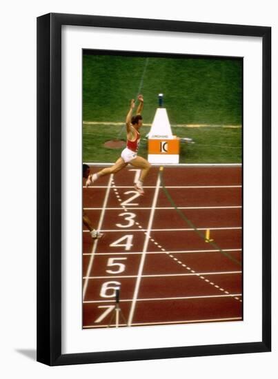 Valeri Borsov of the Soviet Union Winning the 100 Meter Finals During the Summer Olympics-John Dominis-Framed Photographic Print