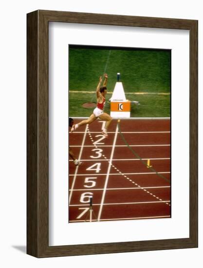 Valeri Borsov of the Soviet Union Winning the 100 Meter Finals During the Summer Olympics-John Dominis-Framed Photographic Print