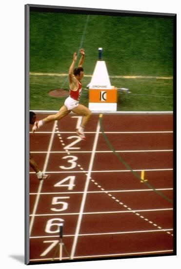 Valeri Borsov of the Soviet Union Winning the 100 Meter Finals During the Summer Olympics-John Dominis-Mounted Photographic Print