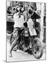 Van Horne Taking a Drink Whilst on His Norton Bike-null-Mounted Photographic Print