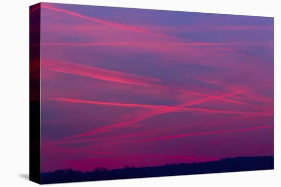 Vapour Trails from Airliners at Dusk-null-Stretched Canvas