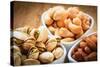 Varieties of Nuts: Cashew, Pistachio, Almond.-Voy-Stretched Canvas
