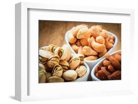 Varieties of Nuts: Cashew, Pistachio, Almond.-Voy-Framed Photographic Print