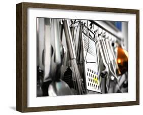 Various Kitchen Utensils Hanging on a Wall-null-Framed Photographic Print