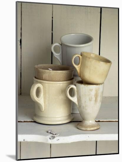 Various Light Coloured Cups on Wooden Shelf-Ellen Silverman-Mounted Photographic Print