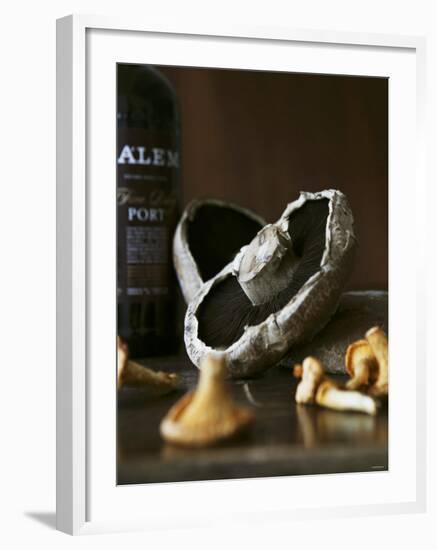 Various Types of Mushrooms in Front of Port Wine Bottle-Henrik Freek-Framed Photographic Print
