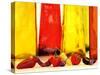 Various Types of Peppers in Front of Red & Yellow Bottles-Monica Varella-Stretched Canvas