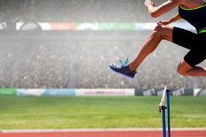 Athletic Woman Practicing Show Jumping against View of a Stadium-vectorfusionart-Photographic Print