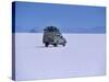 Vehicle Drives across the Crusted Salt of the Salar De Uyuni, the Largest Salt Flat in the World-John Warburton-lee-Stretched Canvas