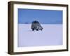 Vehicle Drives across the Crusted Salt of the Salar De Uyuni, the Largest Salt Flat in the World-John Warburton-lee-Framed Photographic Print