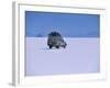 Vehicle Drives across the Crusted Salt of the Salar De Uyuni, the Largest Salt Flat in the World-John Warburton-lee-Framed Photographic Print