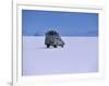 Vehicle Drives across the Crusted Salt of the Salar De Uyuni, the Largest Salt Flat in the World-John Warburton-lee-Framed Photographic Print