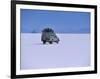 Vehicle Drives across the Crusted Salt of the Salar De Uyuni, the Largest Salt Flat in the World-John Warburton-lee-Framed Photographic Print