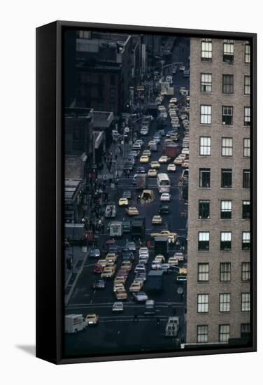 Vehicles on Manhattan's Sixth Avenue at 42nd Street in NYC in 1970s-null-Framed Stretched Canvas