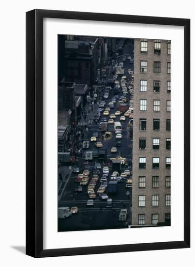 Vehicles on Manhattan's Sixth Avenue at 42nd Street in NYC in 1970s-null-Framed Photo