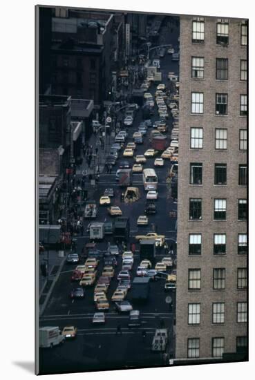 Vehicles on Manhattan's Sixth Avenue at 42nd Street in NYC in 1970s-null-Mounted Photo