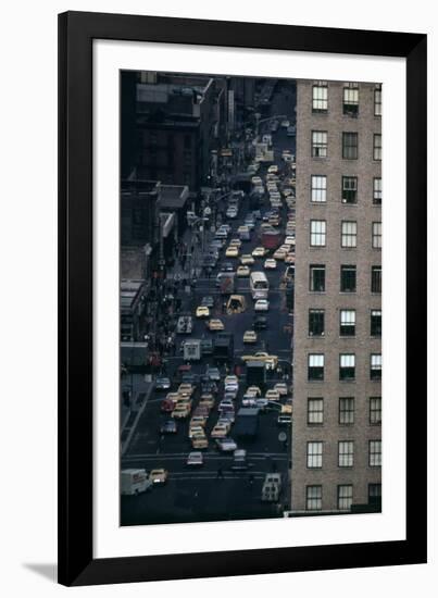 Vehicles on Manhattan's Sixth Avenue at 42nd Street in NYC in 1970s-null-Framed Photo