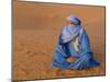 Veiled Tuareg Man Sitting Cross-Legged on the Sand, Erg Chebbi, Morocco-null-Mounted Photographic Print