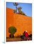 Veiled Woman Bicycling Below Red City Walls, Marrakech, Morocco-Merrill Images-Framed Photographic Print