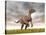 Velociraptor Dinosaur Standing in the Yellow Grass-null-Stretched Canvas