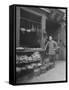 Vendor Standing Next to Vegetables, Eggs and Spices for Sale at Provision Market in Chinatown-null-Framed Stretched Canvas