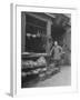 Vendor Standing Next to Vegetables, Eggs and Spices for Sale at Provision Market in Chinatown-null-Framed Photographic Print