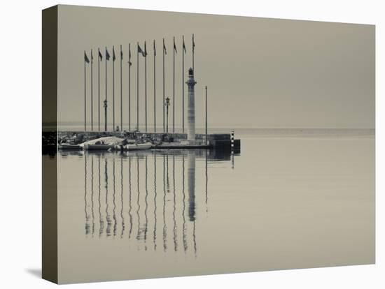 Veneto, Lake District, Lake Garda, Garda, Lakeside Pier and Lighthouse, Italy-Walter Bibikow-Stretched Canvas