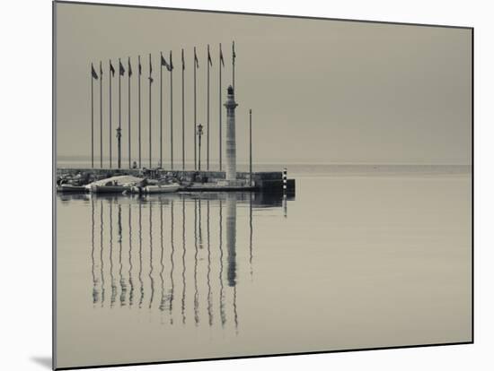 Veneto, Lake District, Lake Garda, Garda, Lakeside Pier and Lighthouse, Italy-Walter Bibikow-Mounted Photographic Print