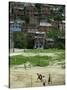 Venezuelan Children Play Soccer at the Resplandor Shantytown-null-Stretched Canvas