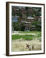 Venezuelan Children Play Soccer at the Resplandor Shantytown-null-Framed Premium Photographic Print