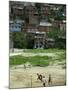 Venezuelan Children Play Soccer at the Resplandor Shantytown-null-Mounted Premium Photographic Print