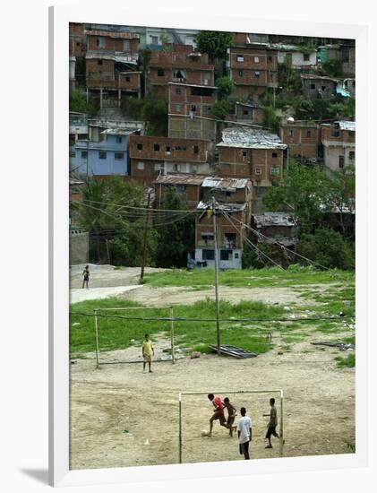 Venezuelan Children Play Soccer at the Resplandor Shantytown-null-Framed Photographic Print