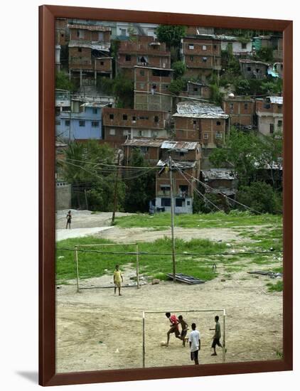 Venezuelan Children Play Soccer at the Resplandor Shantytown-null-Framed Photographic Print