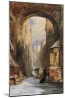 Venice: an Edicola Beneath an Archway, with Santa Maria Della Salute in the Distance, 1853-James Holland-Mounted Giclee Print