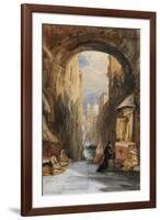 Venice: an Edicola Beneath an Archway, with Santa Maria Della Salute in the Distance, 1853-James Holland-Framed Giclee Print