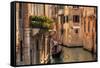 Venice, Italy. A Romantic Gondola Floats on a Narrow Canal among Old Venetian Architecture-Michal Bednarek-Framed Stretched Canvas