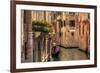 Venice, Italy. A Romantic Gondola Floats on a Narrow Canal among Old Venetian Architecture-Michal Bednarek-Framed Photographic Print