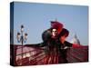 Venice, Veneto, Italy, a Mask in Costume on the Bacino Di San Marco with the Cupola of Santa Maria -Ken Scicluna-Stretched Canvas