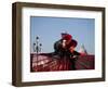 Venice, Veneto, Italy, a Mask in Costume on the Bacino Di San Marco with the Cupola of Santa Maria -Ken Scicluna-Framed Photographic Print