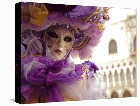 Venice, Veneto, Italy, a Masked Character in Front of the 'Palazzo Dei Dogi' During Carnival-Ken Scicluna-Stretched Canvas