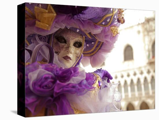 Venice, Veneto, Italy, a Masked Character in Front of the 'Palazzo Dei Dogi' During Carnival-Ken Scicluna-Stretched Canvas