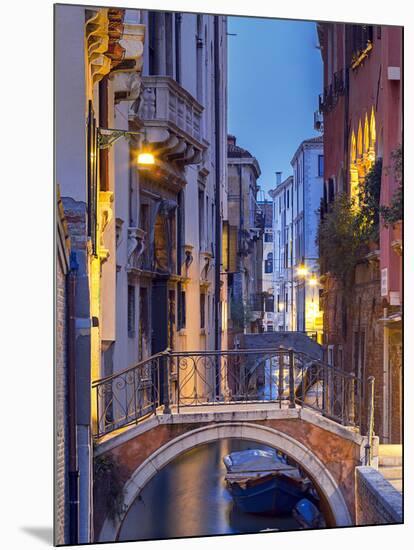 Venice, Veneto, Italy. View over a bridge and a canal at dusk.-ClickAlps-Mounted Photographic Print