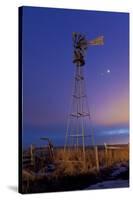 Venus and Jupiter are Visible Behind an Old Farm Water Pump Windmill, Alberta, Canada-null-Stretched Canvas