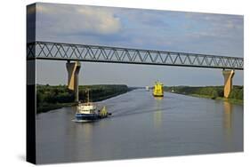 Vessels on Kiel Canal near Brunsbuttel, Schleswig-Holstein, Germany, Europe-Hans-Peter Merten-Stretched Canvas