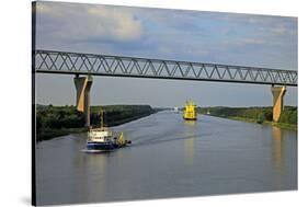 Vessels on Kiel Canal near Brunsbuttel, Schleswig-Holstein, Germany, Europe-Hans-Peter Merten-Stretched Canvas