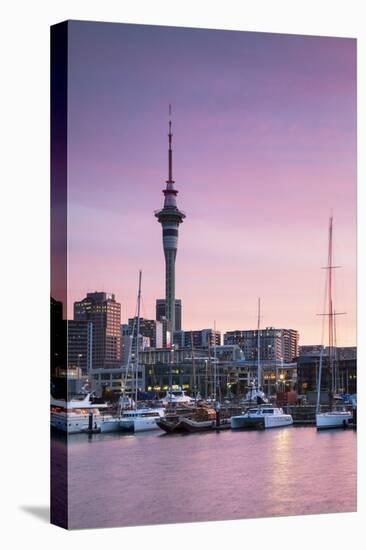 Viaduct Harbour and Sky Tower at Sunset, Auckland, North Island, New Zealand-Ian Trower-Stretched Canvas