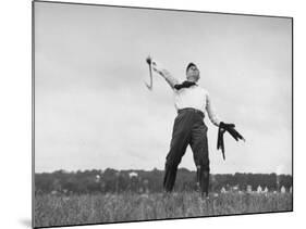 Vice Presidential Candidate Henry A. Wallace, Throwing a Boomerang in a Field-Thomas D^ Mcavoy-Mounted Premium Photographic Print