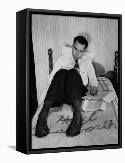 Vice Presidential Candidate Richard M. Nixon Sitting on His Hotel Bed Reviewing Paperwork-Cornell Capa-Framed Stretched Canvas