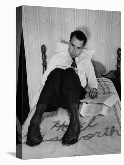 Vice Presidential Candidate Richard M. Nixon Sitting on His Hotel Bed Reviewing Paperwork-Cornell Capa-Stretched Canvas