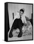 Vice Presidential Candidate Richard M. Nixon Sitting on His Hotel Bed Reviewing Paperwork-Cornell Capa-Framed Stretched Canvas